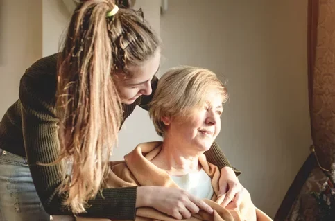 a young carer with their parent
